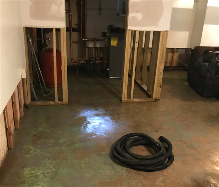 Flooded basement cleanup near me in Madison, CT.