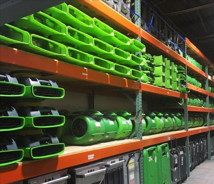 SERVPRO green equipment stocked on shelves